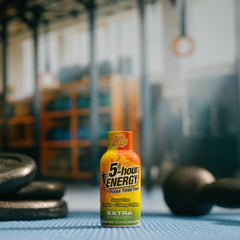 5-hour ENERGY bottle pouring with 230 mg caffeine for a quick energy boost
