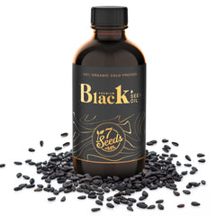7 Seeds Black Seed Oil label closeup shows branding and ingredients.