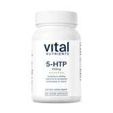 Vital Nutrients 5-HTP bottle on nightstand for calm evenings