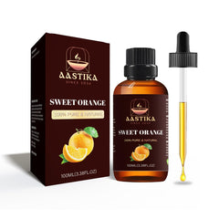 Aastika Sweet Orange essential oil bottle close-up showing pure fragrance
