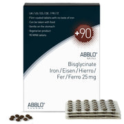 ABBLO Iron Bisglycinate-coated tablet close-up highlighting gentle stomach compatibility.