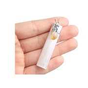 Acxico selenite citrine chakra pendant close-up on silver chain for meditation and energy balance
