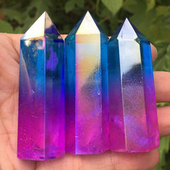 Acxico Titanium Rainbow Quartz obelisk close-up facets showcase sparkling color plating for decor.