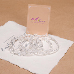 AD Beads Unisex Gemstone Bracelet on wrist demonstrates versatile style for casual to formal.