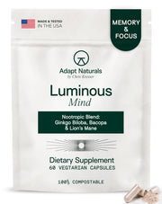 Adapt Naturals Luminous Mind bottle on a tidy desk supports daytime focus.
