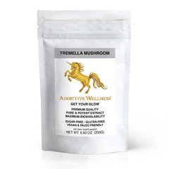 Addictive Wellness Tremella wood-grown powder bottle close-up showing purity and ease of blending in beverages