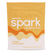 AdvoCare Spark orange-cream stick pack closeup for convenient energy on the go.