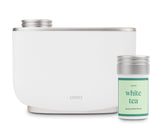 Aera diffuser with a sleek white design for modern living spaces