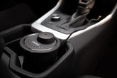 Aera Go car diffuser connected to USB power delivering a fresh cabin scent