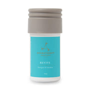 Aera Revive bottle close-up showing juniper berry notes for a refreshed space
