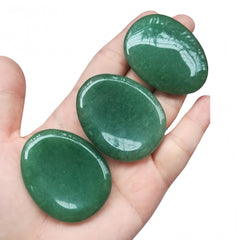 Afucats Green Aventurine worry stone on a desk setup for mindful work breaks