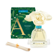 AGRARIA Blue Spruce AirEssence diffuser bottle releases pine notes for a welcoming space.
