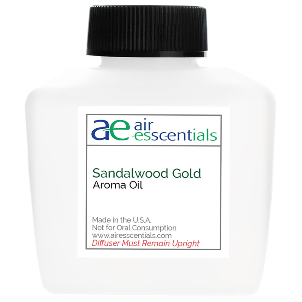 Air Esscentials Sandalwood Gold bottle pour, ideal for diffusers and long-lasting scent