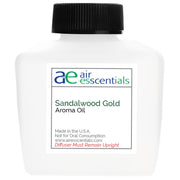Air Esscentials Sandalwood Gold bottle pour, ideal for diffusers and long-lasting scent