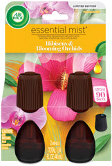 Air Wick Essential Mist Hibiscus Blooming Orchids bottle pour; refreshing living spaces