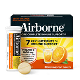 Airborne 1000mg Vitamin C tablet dissolving in water for immune support.