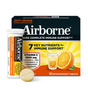 Airborne 1000mg Vitamin C tablet dissolving in water for immune support.