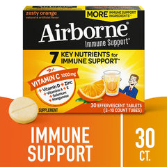 Airborne dissolving tablet in water shows quick, refreshing orange fizz.