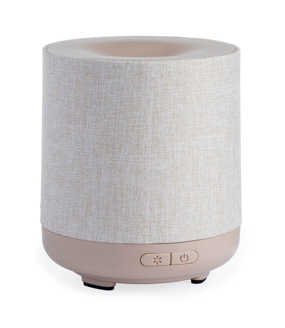 Airome Ceramic Essential Oil Diffuser with 100 mL tank releasing a subtle aromatic mist.