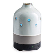 Airome ceramic diffuser front view with glazed concrete finish for a modern decor accent.