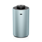 Airversa ANX diffuser top view in mint metal finish, creating room aroma