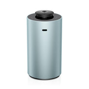 Airversa ANX diffuser top view in mint metal finish, creating room aroma