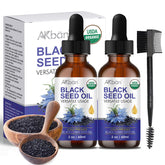AKBAN Black Seed Oil bottle shows pure, cold-pressed oil ideal for skin and hair care.