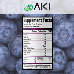 AKI Berry Bombshell blueberry powder scoop ready to blend into drinks.