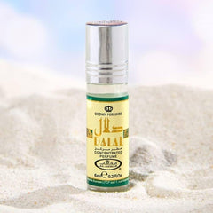 Dalal perfume oil roll-on close-up showing the compact 6ml bottle.