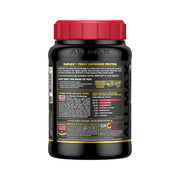 AllMax ISOFLEX Orange Dreamsicle scoop with 27 g protein per serving