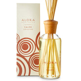Alora Ambiance Caldo 16oz diffuser filling a living room with a welcoming scent