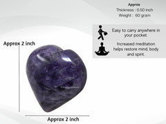 Amazing Gemstone amethyst heart palm stone held during energy work for focus and calm.