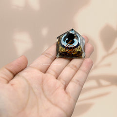 Amazing Gemstone black obsidian sphere emphasizes dark, protective accents.