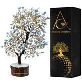 Amazing Gemstone Blue Opal Crystal Tree of Life adds calming ambiance to a serene bedroom.