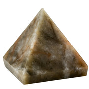 Amazing Gemstone Chrysoberyl Cats Eye Pyramid close-up reveals natural texture for meditation focus.