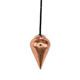 Amazing Gemstone copper dome pendulum in hand for divination and yes/no guidance.