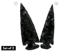 Amazing Gemstone obsidian arrowhead close-up showing natural texture and shine.