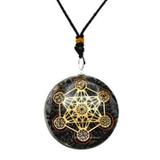 Amazing Gemstone Orgone Pendant closeup with black tourmaline; stylish daily wear with energizing vibes.