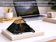 Amazing Gemstone pyramid on desk acts as a stylish paperweight