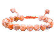 Amazing Gemstone Red Picasso Jasper bracelet beads closeup, showing natural color and texture.