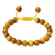 Amazing Gemstone Yellow Cat's Eye bracelet close-up beads for grounding and style.