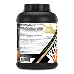 Amazing Nutrition Amazing Muscle whey butterscotch shake glass highlighting creamy texture.
