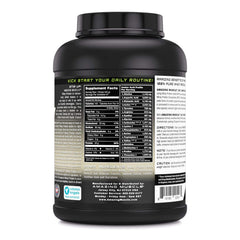 Amazing Nutrition Amazing Muscle Whey shake in glass shows creamy cookies-cream texture.