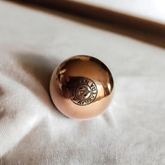 American Ayurveda copper ball during handheld meditation promotes grounding and focus