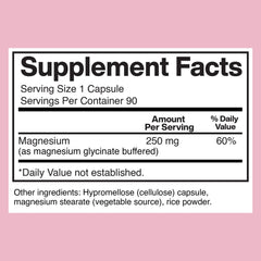 Closeup of American Standard Magnesium Glycinate capsules.