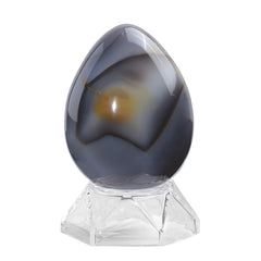 Amogeeli Orca Agate Sphere on acrylic stand adds color and balance to any room.