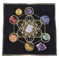 Amogeeli seven chakra stones aligned to support chakra flow and calm ambiance.