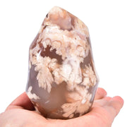 AMOYSTONE Cherry Blossom Agate flame tower for focused meditation and serene home decor.
