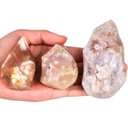 AMOYSTONE Cherry Blossom Agate flame tower for meditative focus and calm energy.
