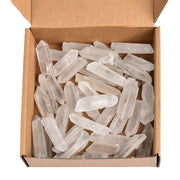 AMOYSTONE clear quartz points in a box front, enhancing light and energy in any space.
